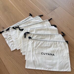 Cuyana Cream Drawstring Dust Bags, set of 6. Approx 12 x 9”@